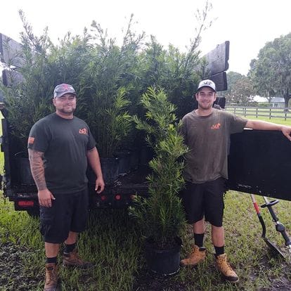 Lush Greenery and Tranquil Water Feature - Absolute Outdoors LLC Build Landscapes with Natural Beauty